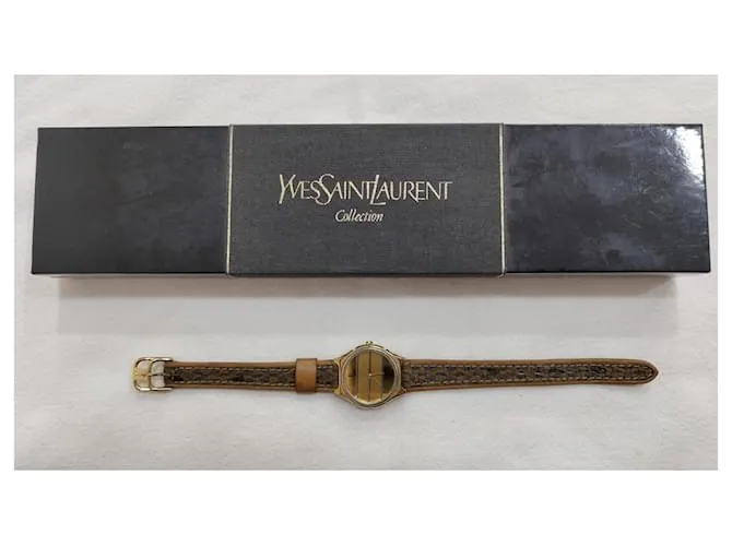 Yves Saint Laurent Relojes finos Dorado 